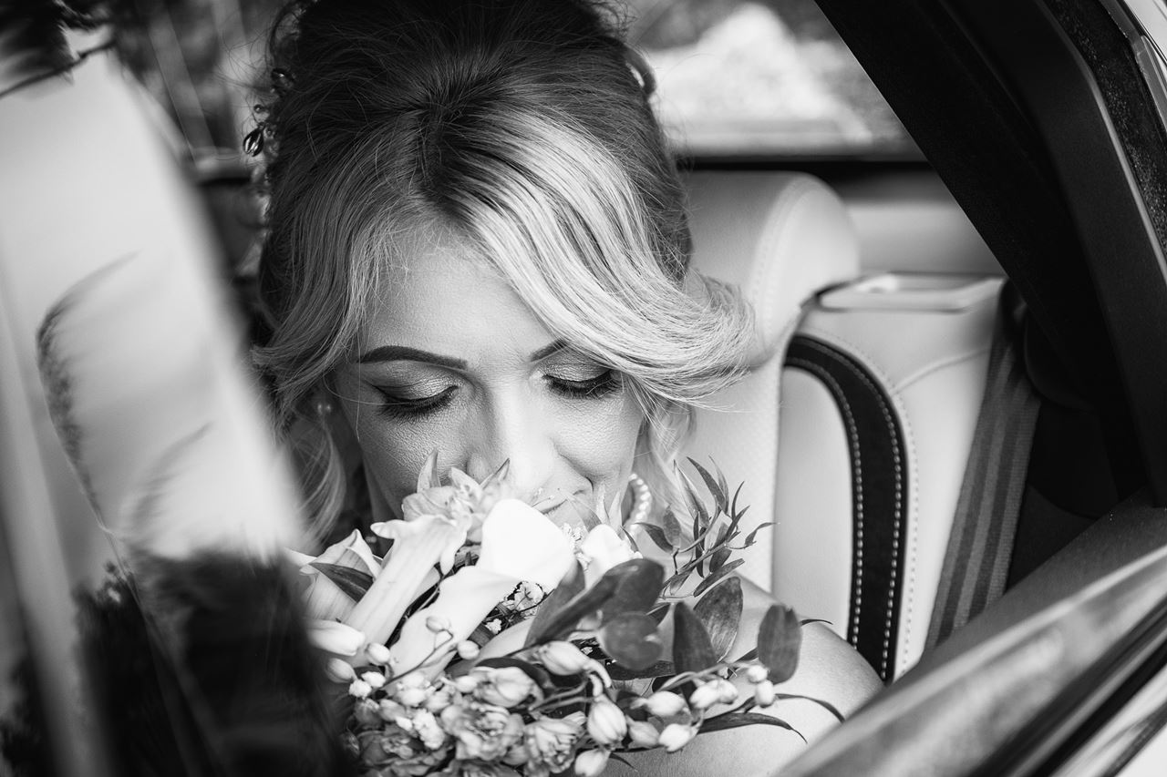 bride with lilly flowers